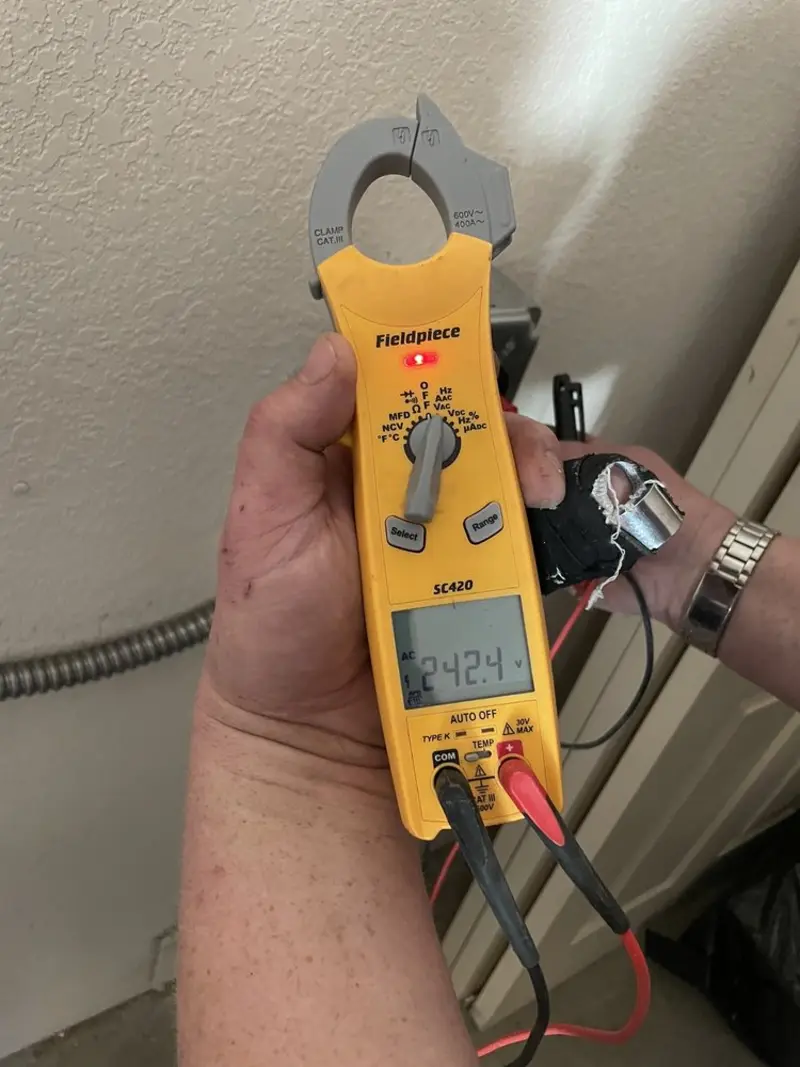 Voltage testing with clamp meter during Electrical Installation Services in Torrance